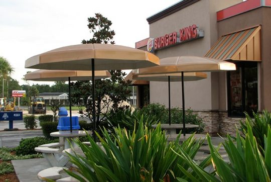 6' Octagonal Umbrellas with Valance installed at Burger King in Beech Nut color