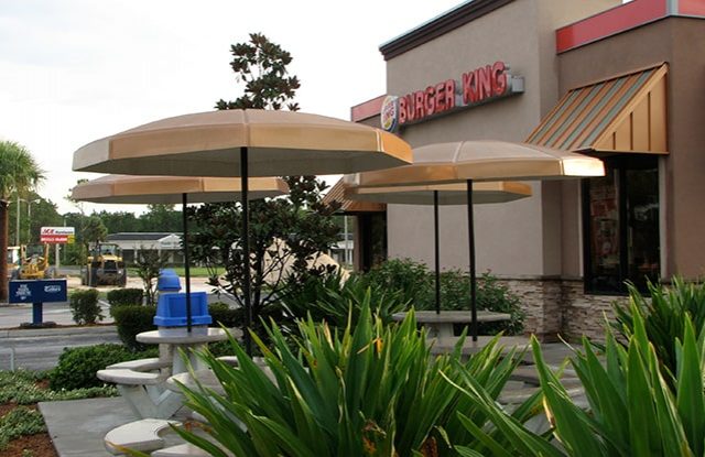 6' Octagonal Umbrellas with Valance installed at Burger King in Beech Nut color